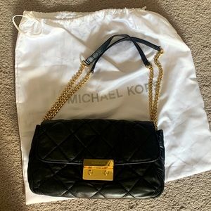 Double clutch bag, very spacious, gold tone hardware, adjustable strap